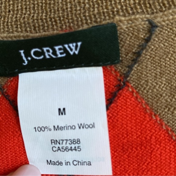 J Crew
Women’s 
Wool 
Medium 
V-Neck Argyle Sweater
Tan and Orange 
EUC - Picture 11 of 11